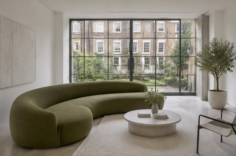 Pared-back refurbished interior with broad glazing in Barnsbury