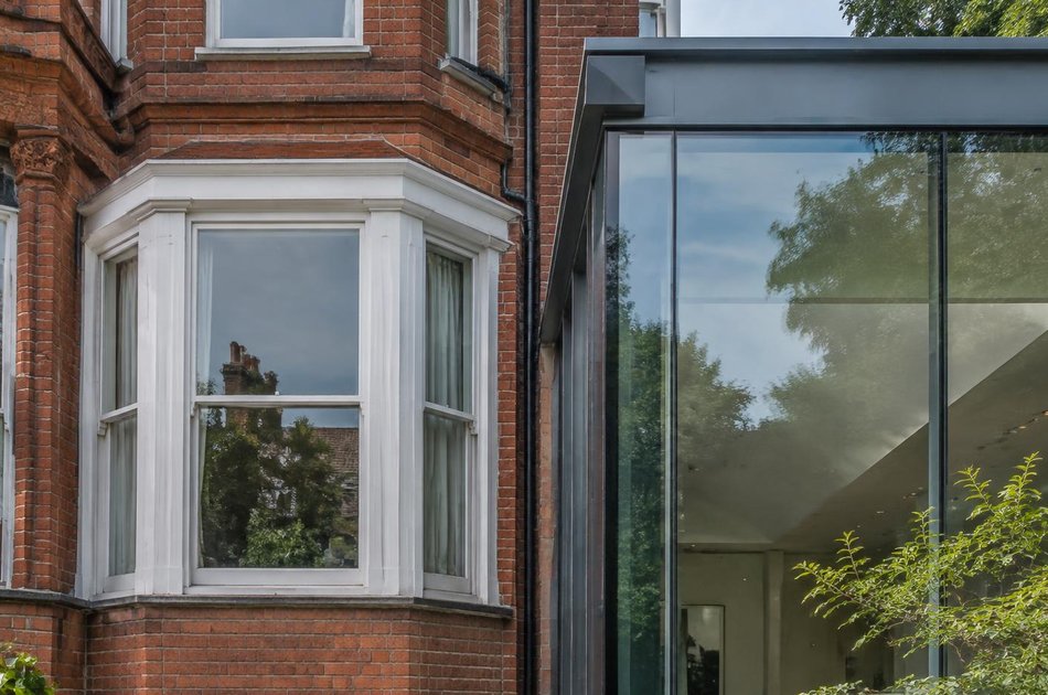 Period facade beside a new contemporary extension in Bedford Park
