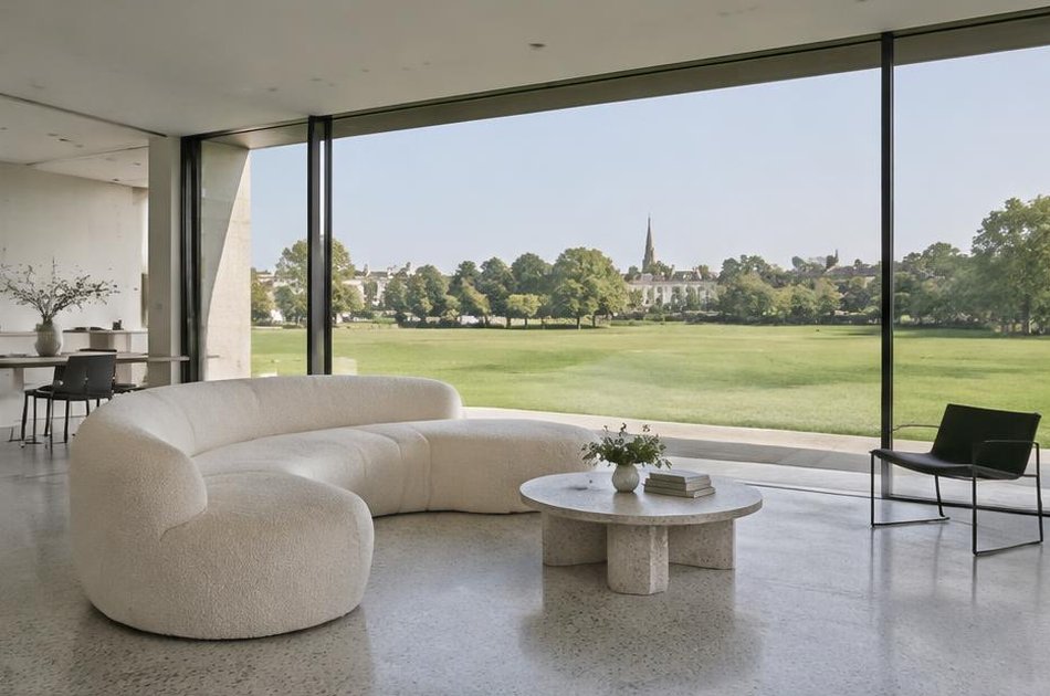 Open-plan living room with full-height glazing onto the heath in Blackheath