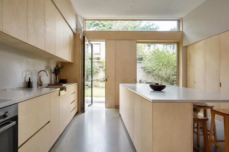 Plywood kitchen in a rear extension in Bowes Park