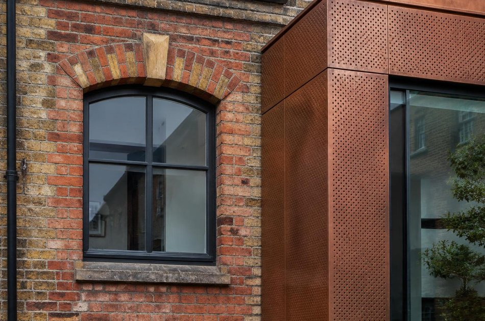 Period facade beside a new contemporary extension in Brent