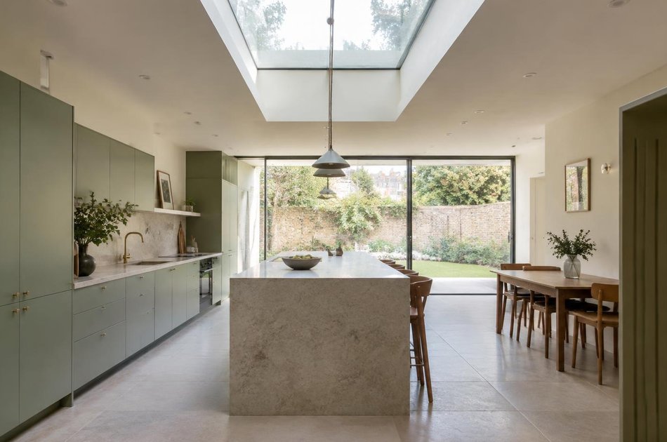 Garden-level kitchen extension behind a Georgian house in Bruce Grove