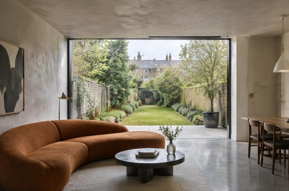Contemporary glazed garden extension behind a period home in Camberwell