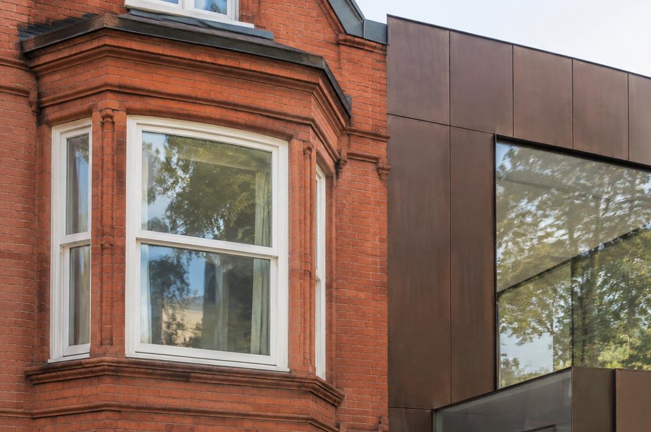 Period facade beside a new contemporary extension in Chiswick