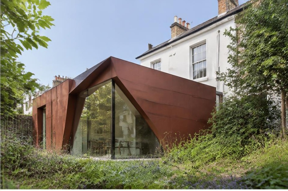 Contemporary glazed garden extension behind a period home in Clapham