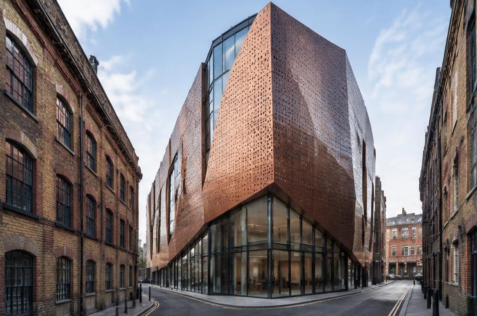 Contemporary perforated copper residence beside period buildings in Clerkenwell