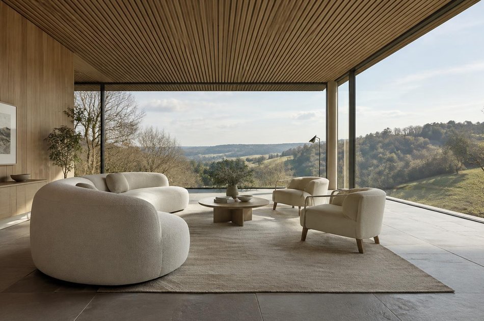 Contemporary living space opening onto a garden in Coulsdon