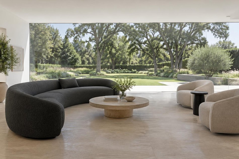Contemporary living space opening onto a garden in Emerson Park