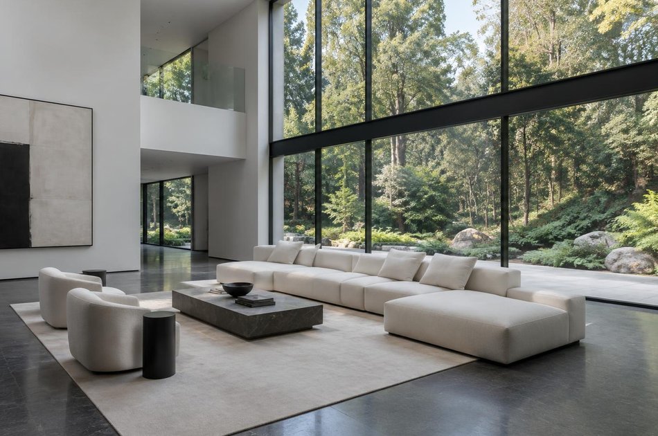 Contemporary living space opening onto a garden in Farnborough