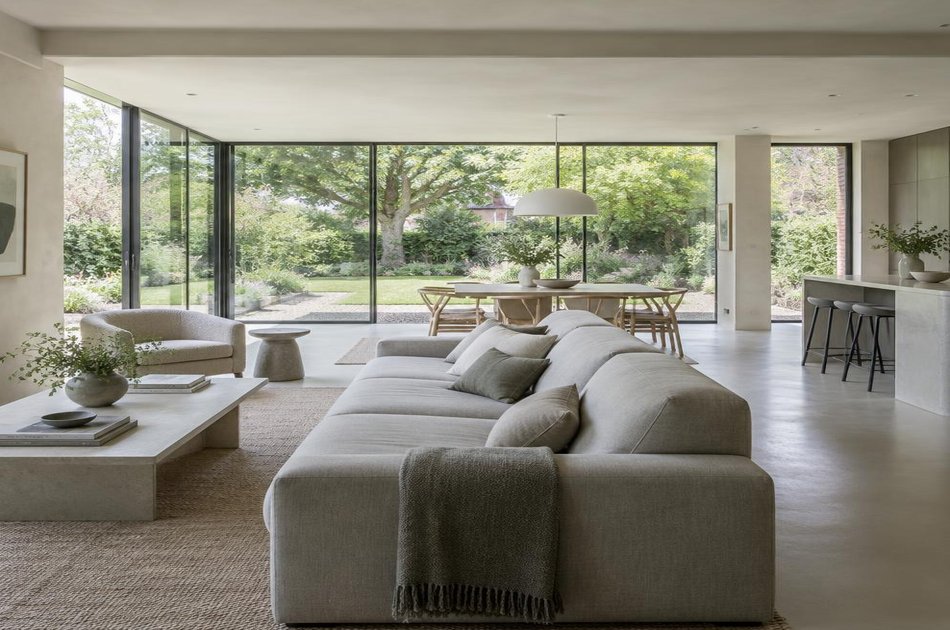 Contemporary living space opening onto a garden in Forty Hill