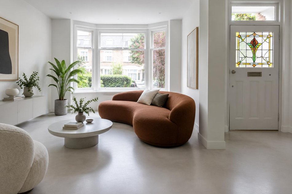 Refurbished modern interior with a retained period feature in Golders Green