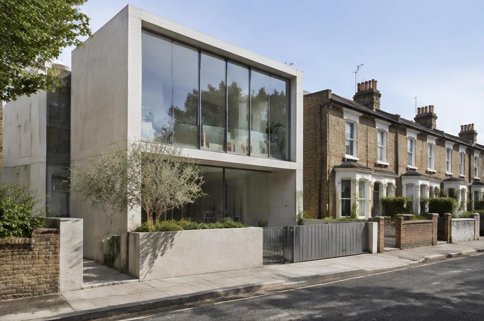 Bold contemporary architecture beside local residential buildings in Gospel Oak