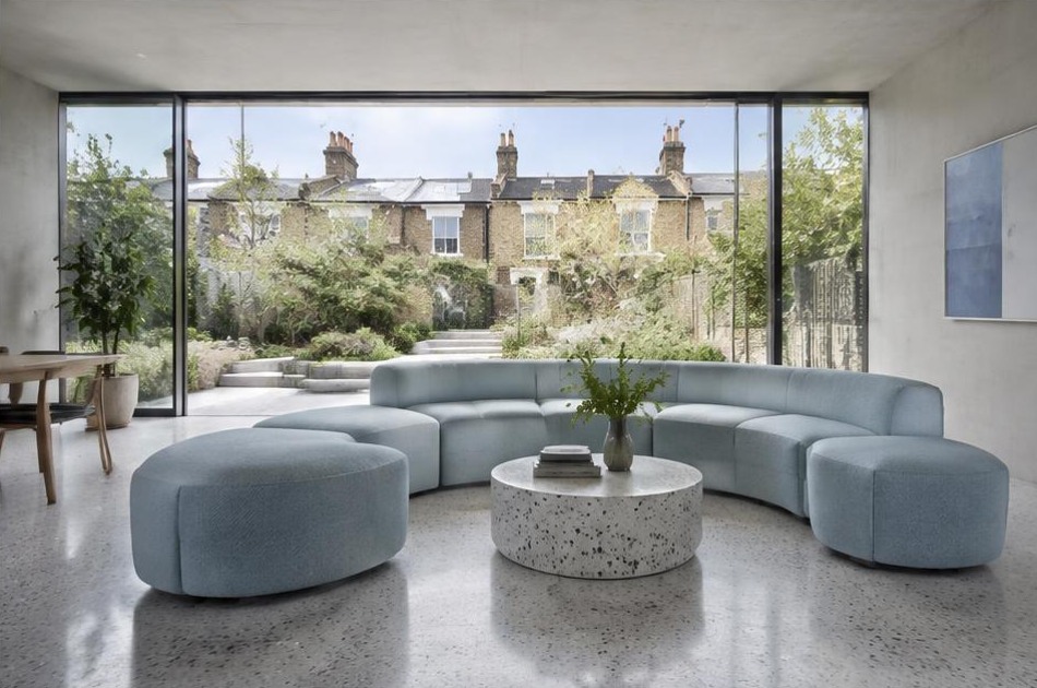 Contemporary refurbished interior with broad garden glazing in Gospel Oak