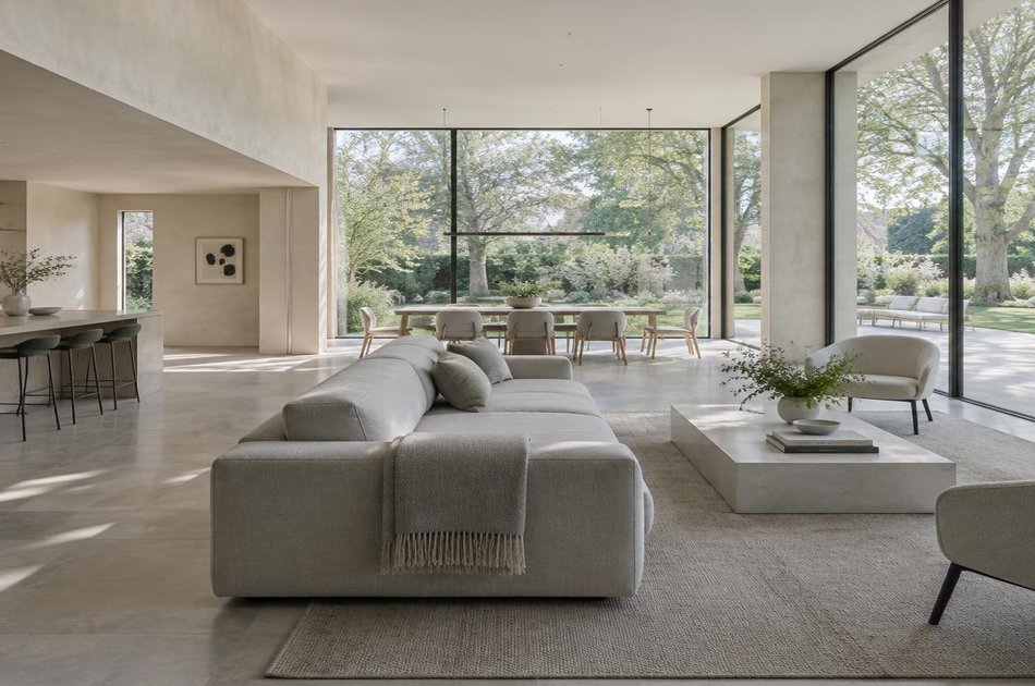 Contemporary living space opening onto a garden in Hadley Wood