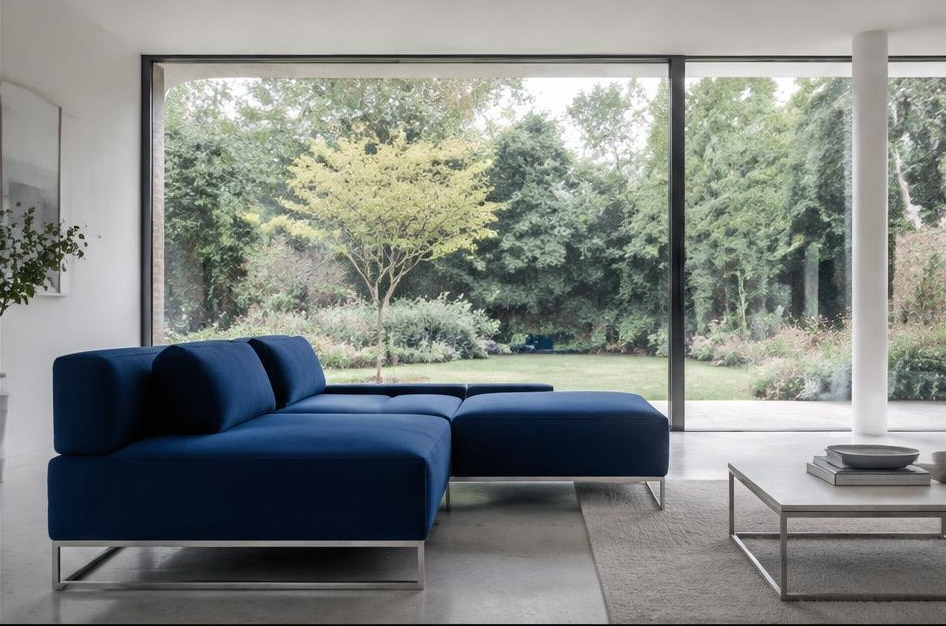 Minimalist garden living space with broad glazing in Ham