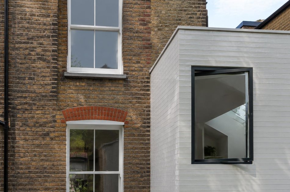 Period facade beside a new contemporary extension in Harlesden