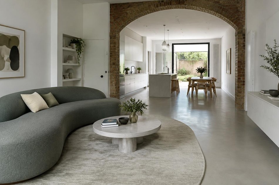 Refurbished modern interior with a retained period feature in Harlesden