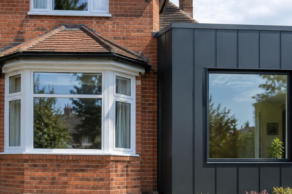 Period facade beside a new contemporary extension in Harold Wood