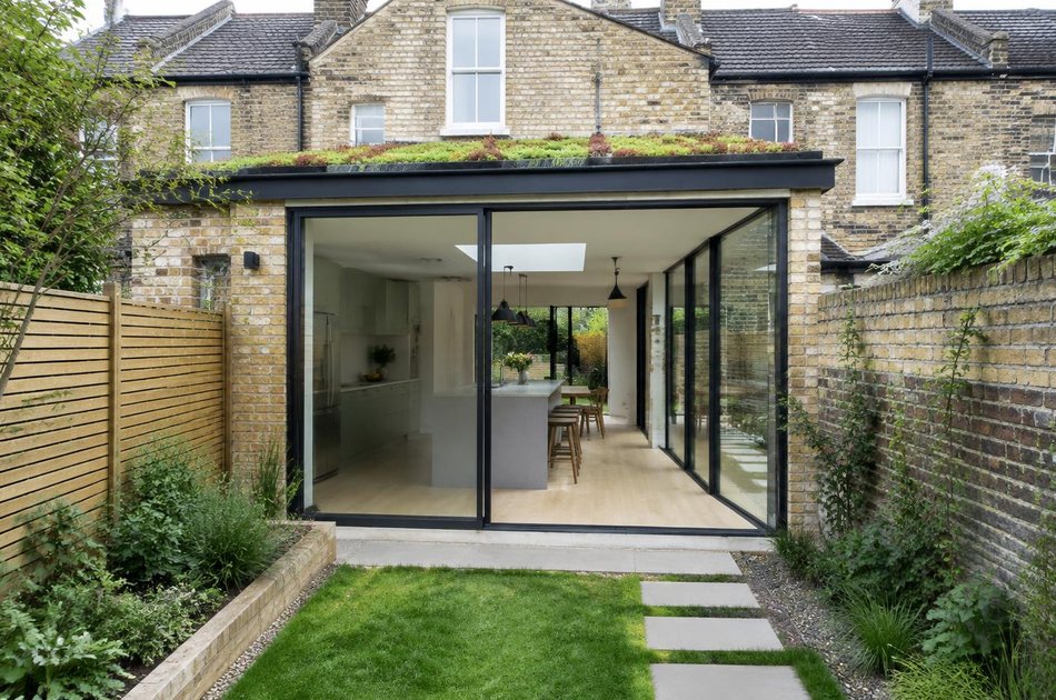 Kitchen extension with green roof in a Harringay terrace