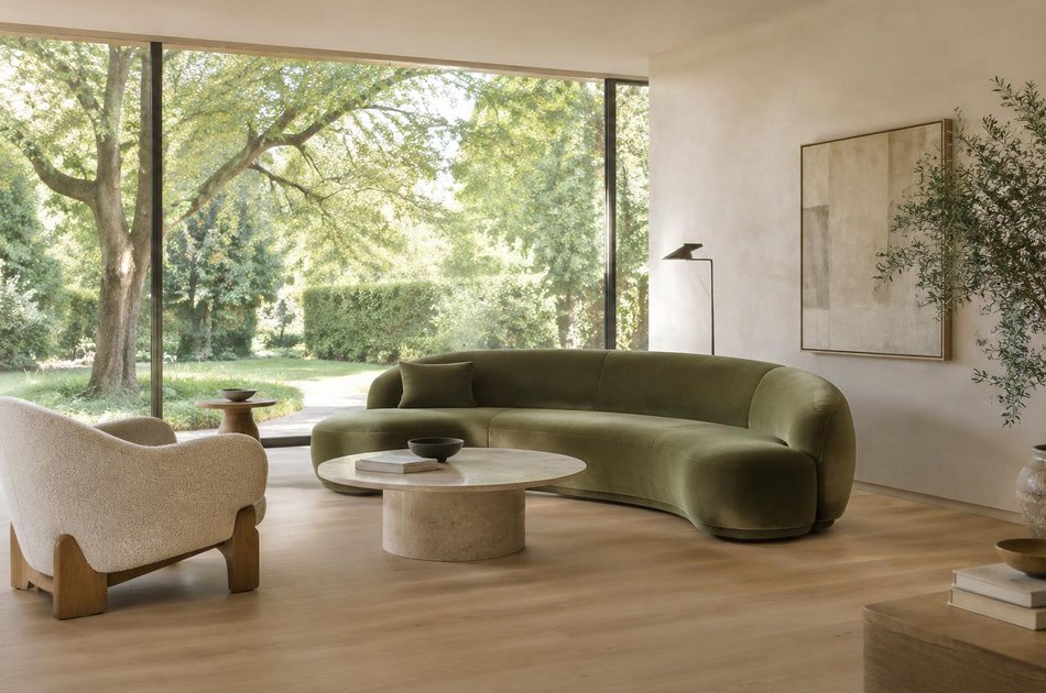 Contemporary living space opening onto a garden in Hatch End