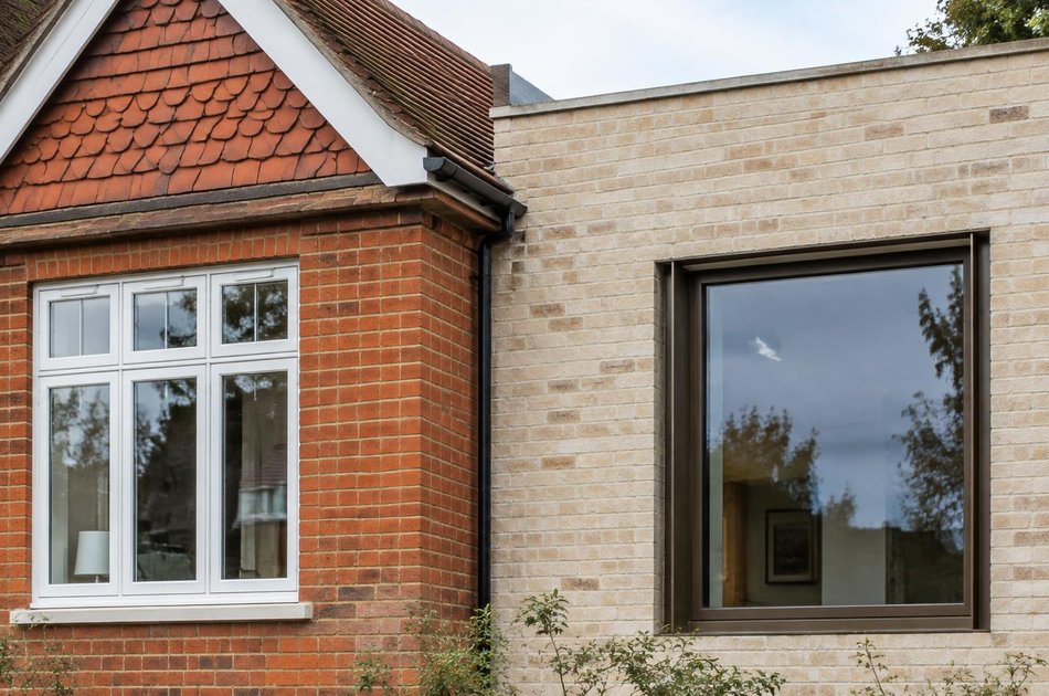 Period facade beside a new contemporary extension in Hatch End