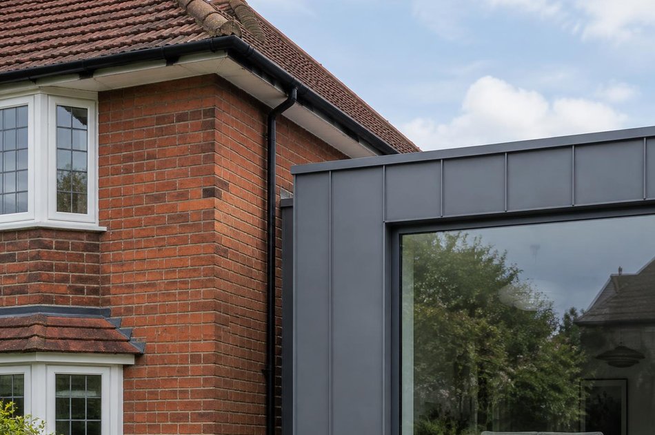 Period facade beside a new contemporary extension in Havering