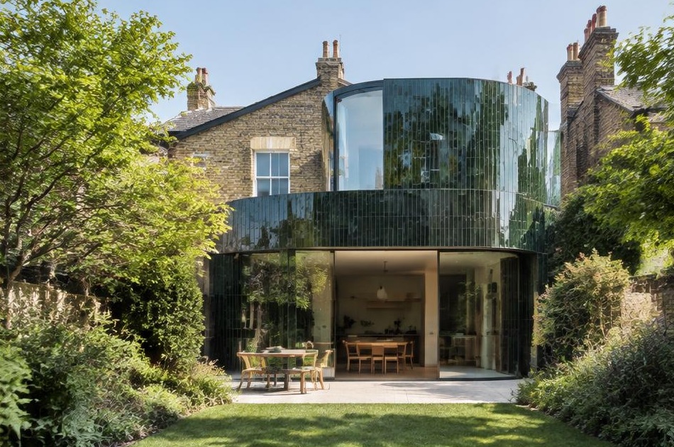 Contemporary glazed garden extension behind a period home in Herne Hill