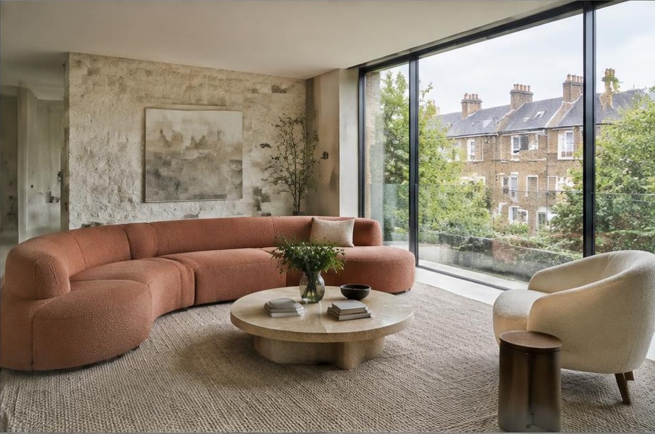 Contemporary refurbished interior with broad garden glazing in Highgate
