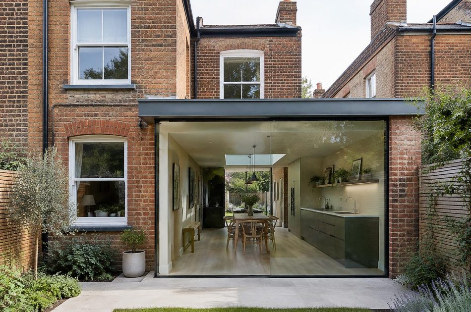 Edwardian terrace beside a frameless glass side-return extension in Hither Green