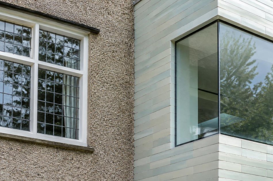 Period facade beside a new contemporary extension in Hornchurch