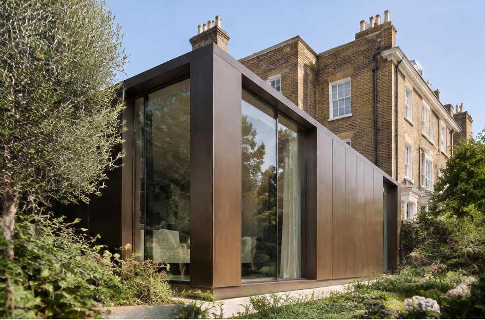 Contemporary glazed garden extension behind a period home in Hurlingham