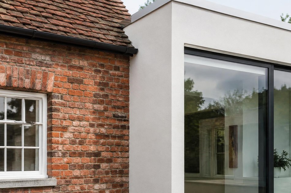 Period facade beside a new contemporary extension in Isleworth