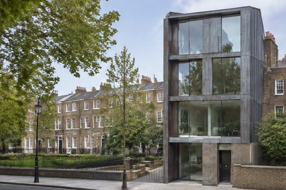 Contemporary copper-clad residence beside period buildings in Islington