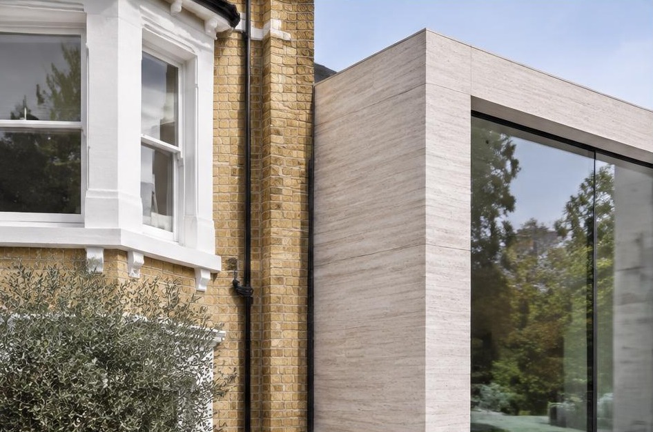 Retained historic facade meeting a bold contemporary residential addition in Kew
