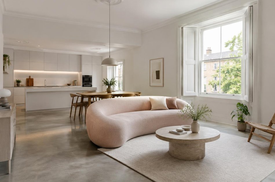 Refurbished modern interior with a retained period feature in Kilburn