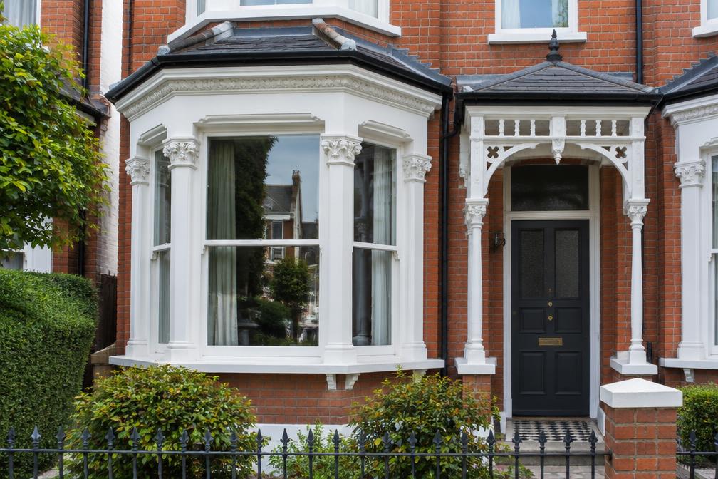 Victorian bay window and porch detail on a terraced house in Leytonstone