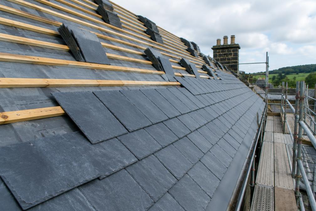 Slate roof being laid on battens and membrane in Lloyd Park