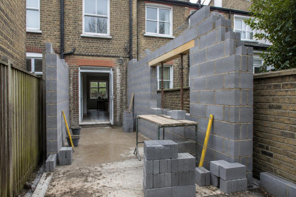Blockwork walls rising for a side-return extension on a narrow plot