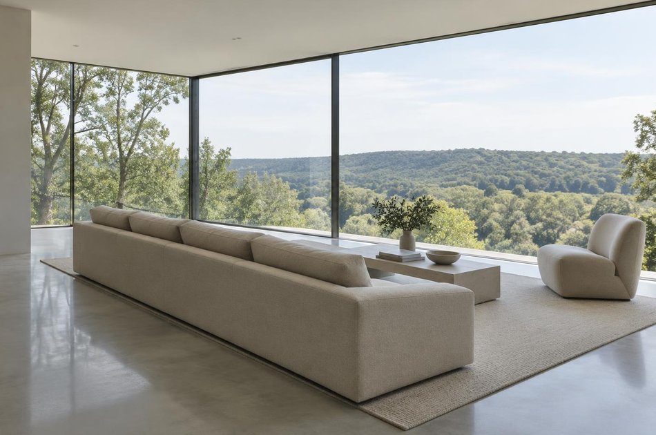 Contemporary living space opening onto a garden in Mill Hill