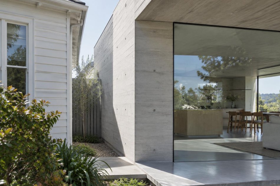 Period facade beside a new contemporary extension in Mill Hill