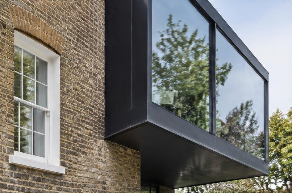 Retained historic facade meeting a bold contemporary residential addition in Mortlake