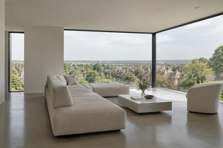 Living space with a linear sofa and long views over Muswell Hill