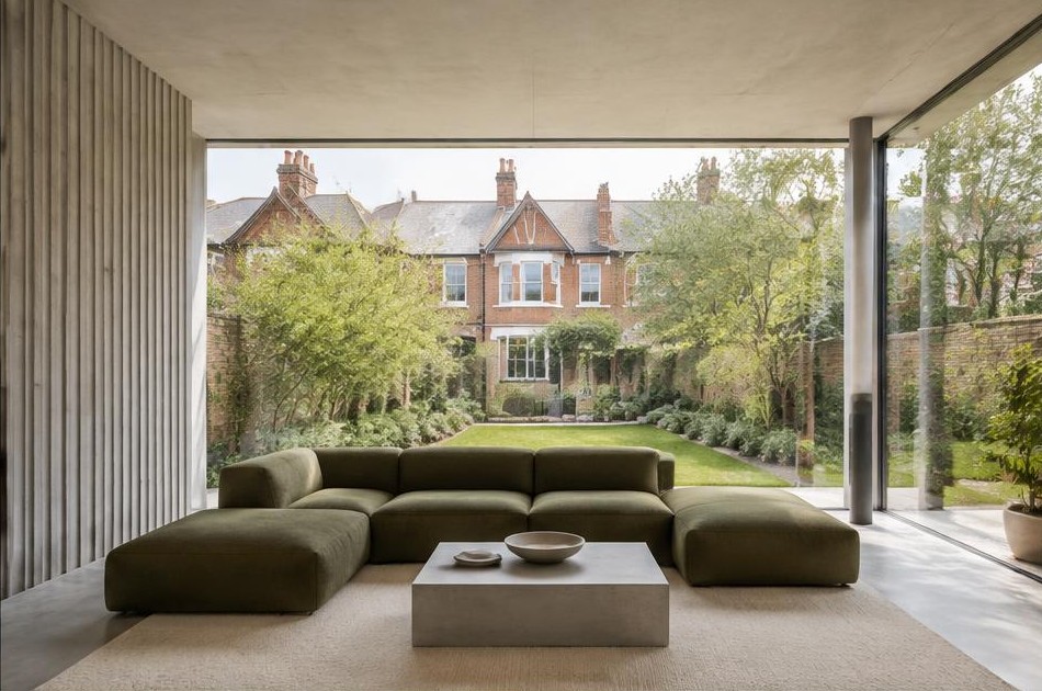 Minimalist living space with local residential garden views in New Malden