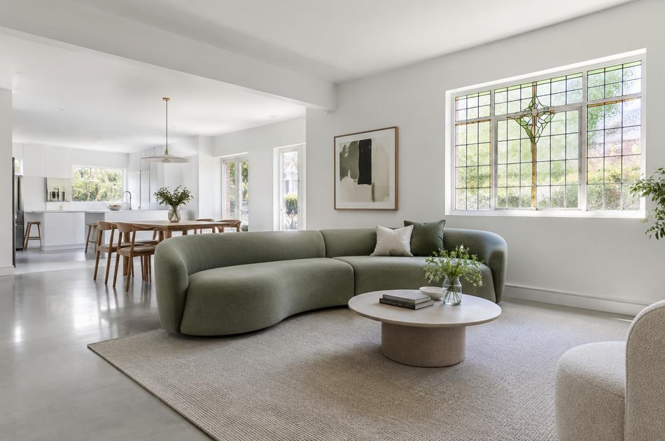 Refurbished modern interior with a retained period feature in Osterley