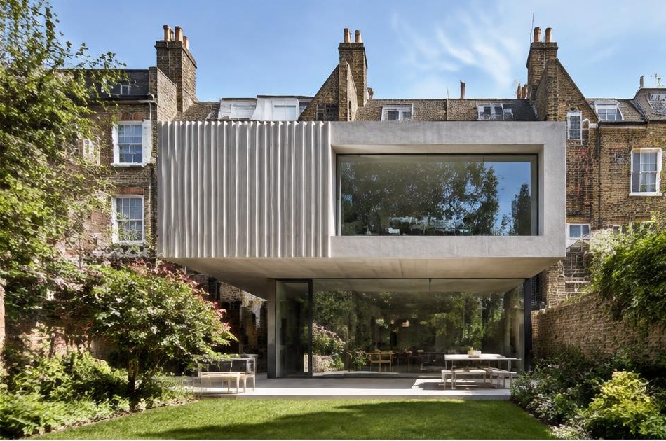 Contemporary glazed garden extension behind a period home in Oval