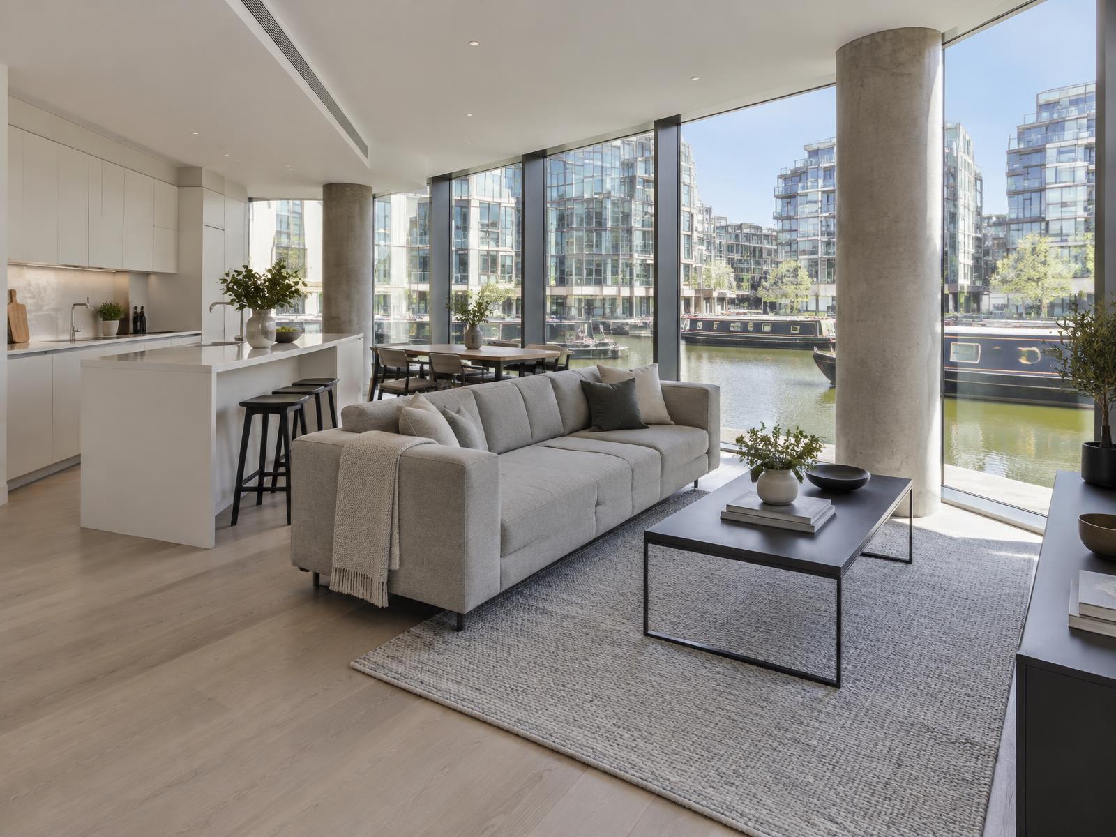 New waterside apartment with concrete columns and full-height glazing over the Paddington Basin