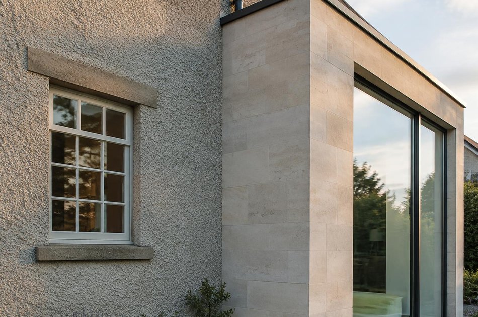 Period facade beside a new contemporary extension in Purley