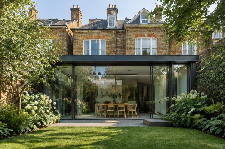 Contemporary glazed garden extension behind a period home in Putney
