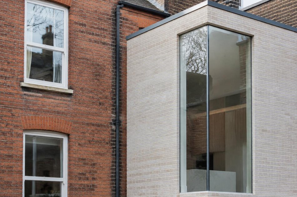 Period facade beside a new contemporary extension in Queens Park