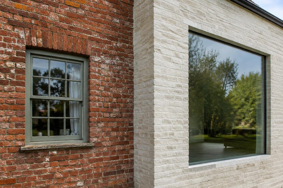 Period facade beside a new contemporary extension in Rainham